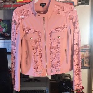 See through pink shirt.